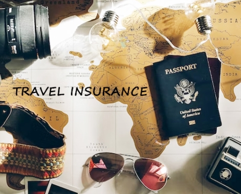 Passport, camera, and travel gear on a map – visitor travel insurance Canada